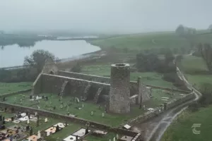 Drumlane Abbey, Round Tower and graveyard on the shores of Derrybrick Lough in Cavan Ireland's Ancient East