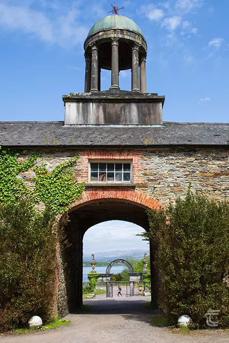 The entrance to the stables of Bantry House through a carriage arch with domed cupola on the roof. 