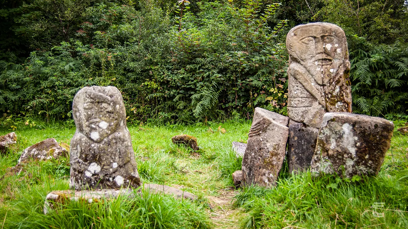 Two stone idols in Caldragh Cemetary, Boa Island, Fermanagh