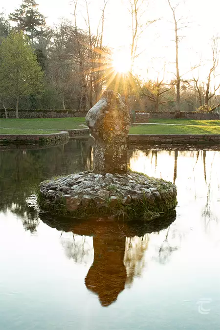 the cross of St Patrick's Well, at sunset, Co. Tipperary
