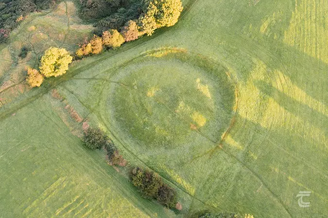 Aerial view of a circular earthwork known as Ráith Gráinne on the Hill of Tara