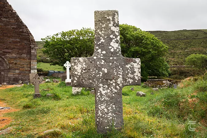Stone cross in the graveyard of Kilmalkedar Church, Kerry.
