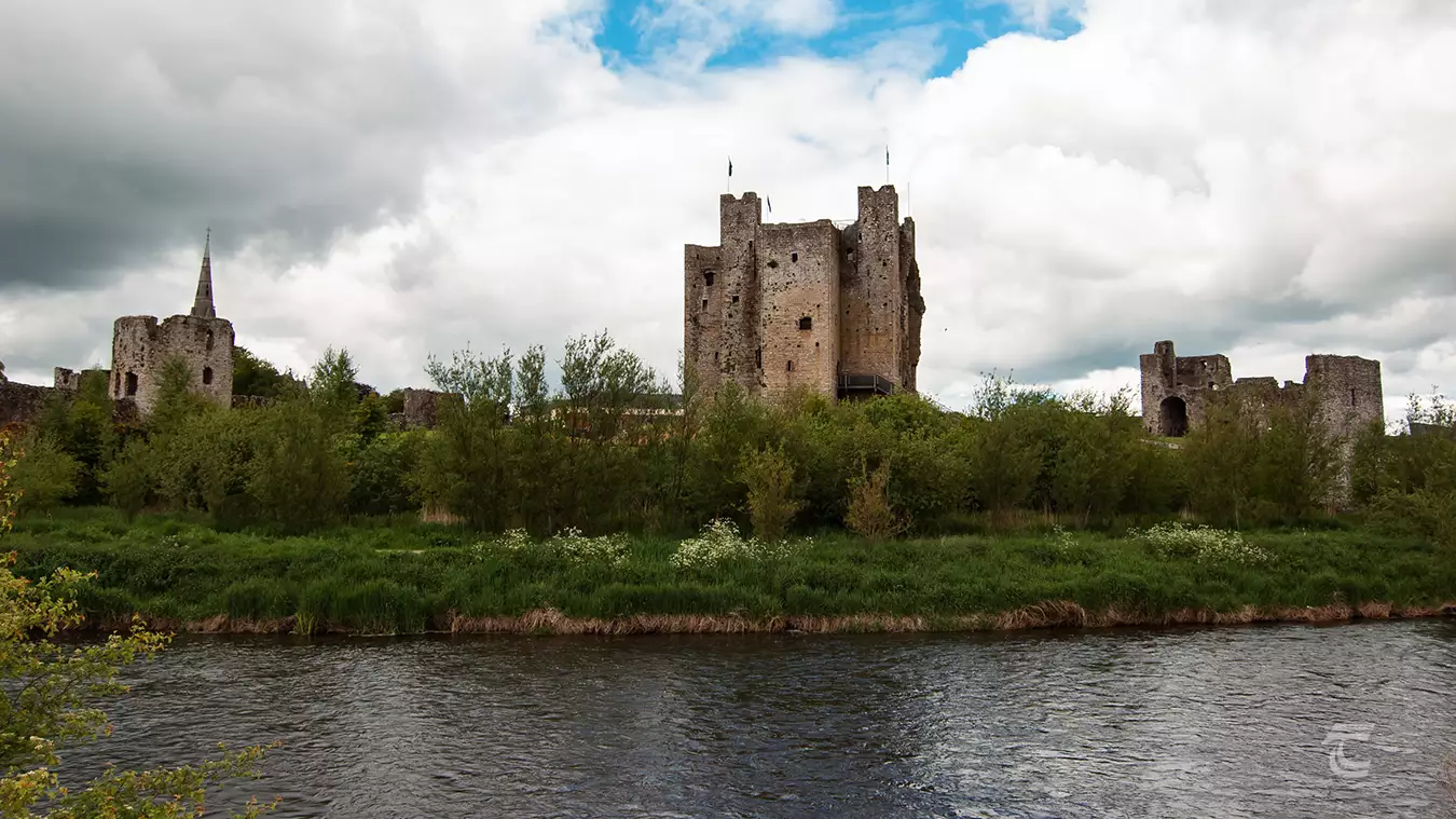 Trim Castle on a cloudy day, viewed from the banks of the Boyne, Meath.