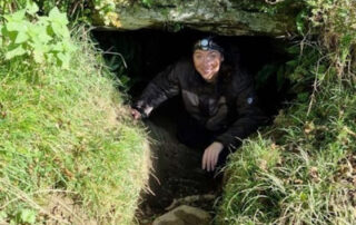 Ruth at the entrance of a souterrain at Oweynagat, Co Roscommon