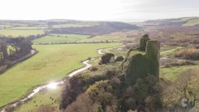 An aerial view of Dunhill Castle in the Anne Valley of County Waterford Ireland
